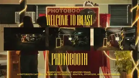 Lit iBlast Photobooth welcome signage and printed photo display at an evening event